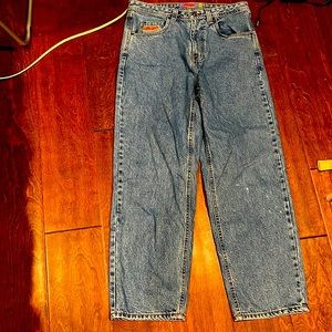 Used Empyre Relaxed Jeans. Has a stain.  See the photo.